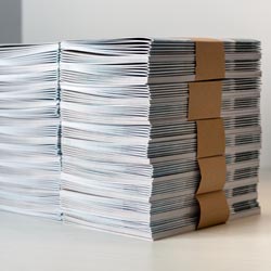 Bundles of newly printed catalogues Catalogue design company